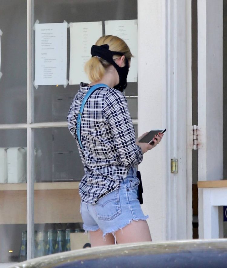 Emma Roberts Spotted In Denim Shorts Out For An Iced Coffee